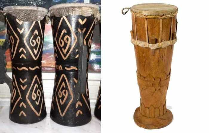 Alat musik tifa yang berasal dari papua dimainkan dengan cara