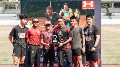 Timer Petugas Waktu dalam Perlombaan Lari